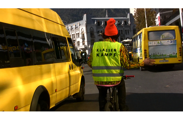 apa '12, Rainer Ganahl, 'Bikeway Tbilisi' (video still), 2011